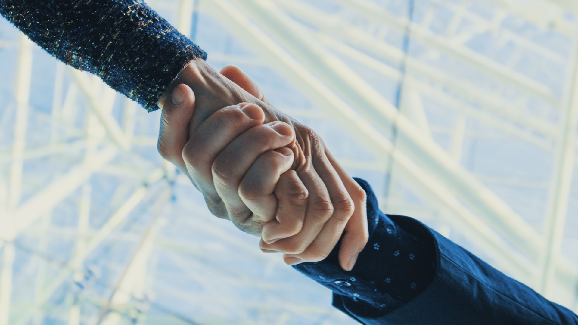 Closeup of hands being shaken